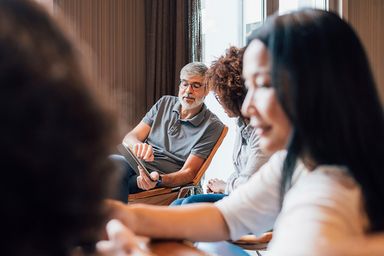 Friends and family enjoy casual conversation
